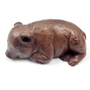 Sleeping Pig Figurine Handcrafted from Pecan Shells by Red Mill Manufacturing